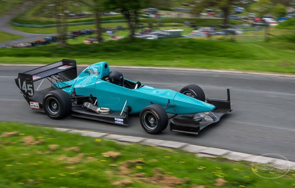 Ben Stevenson competing in his turquoise Empire