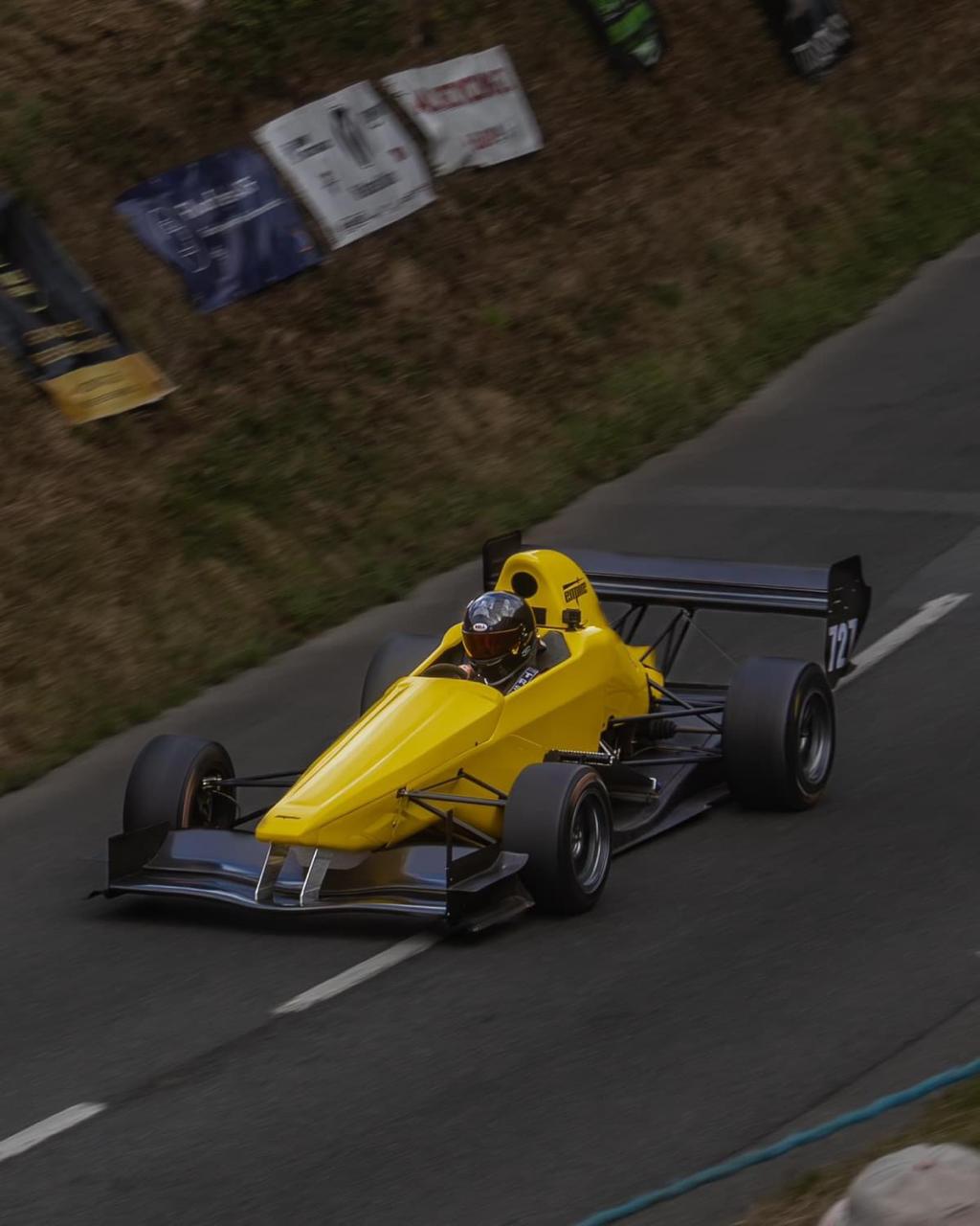 Emma Rayson competing in her yellow Empire