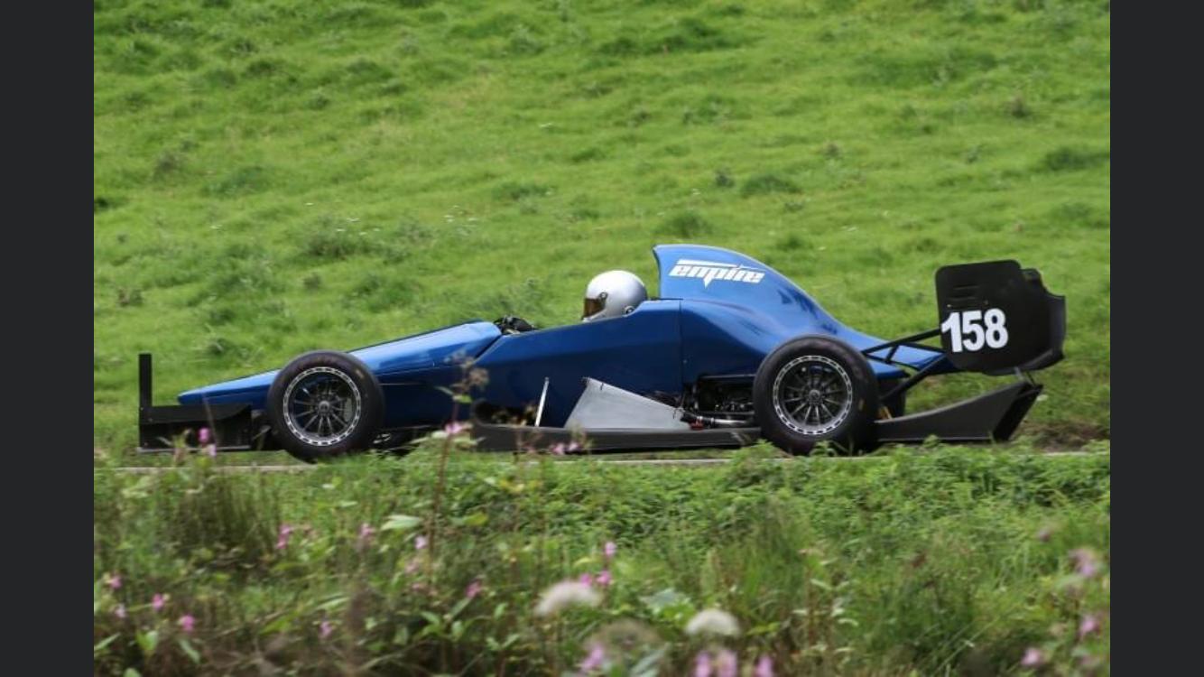 Jason Tunnicliffe driving his Empire Evo