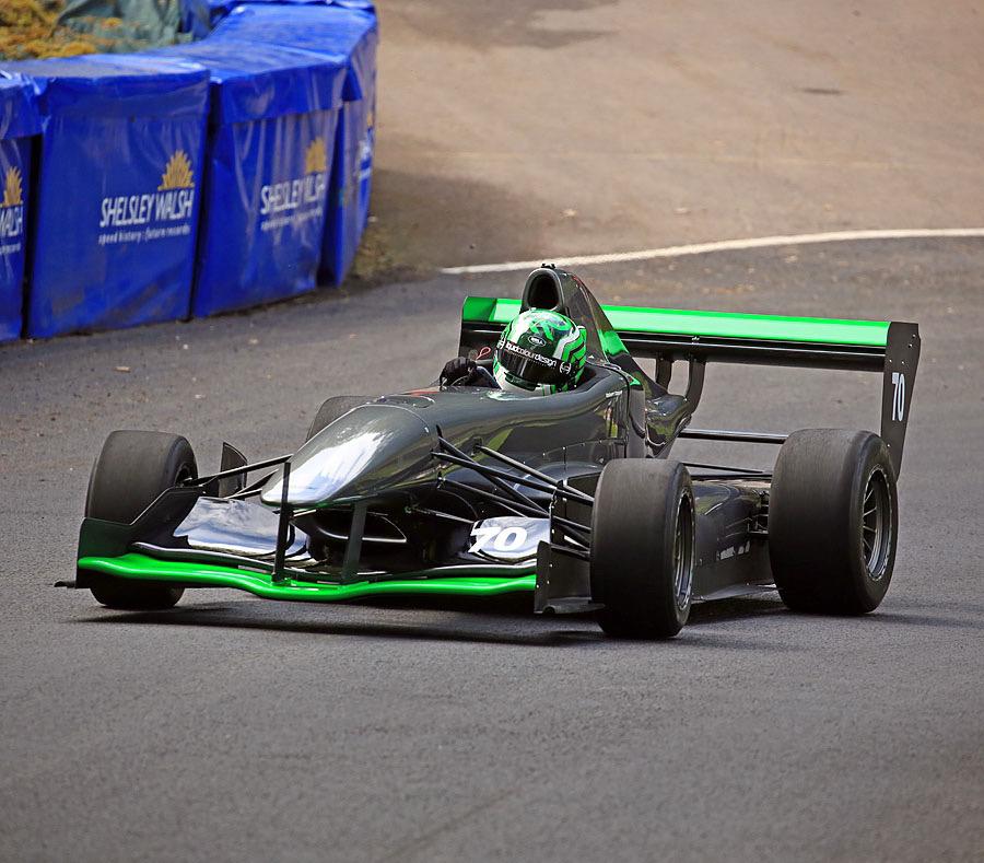 Rob Capper competing in his grey and green Empire